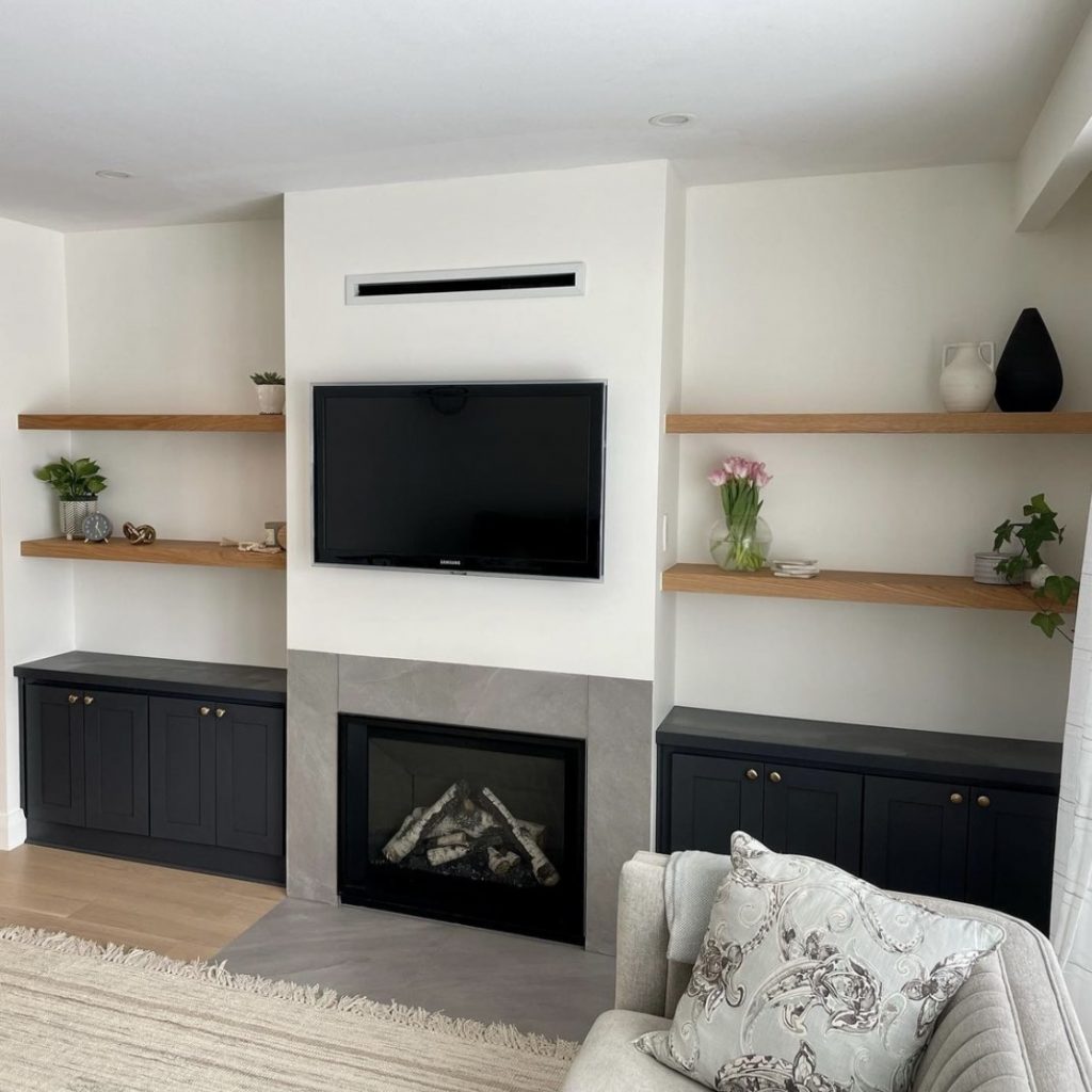 custom built in fireplace with cabinets and white oak floating shelves custom carpentry in toronto